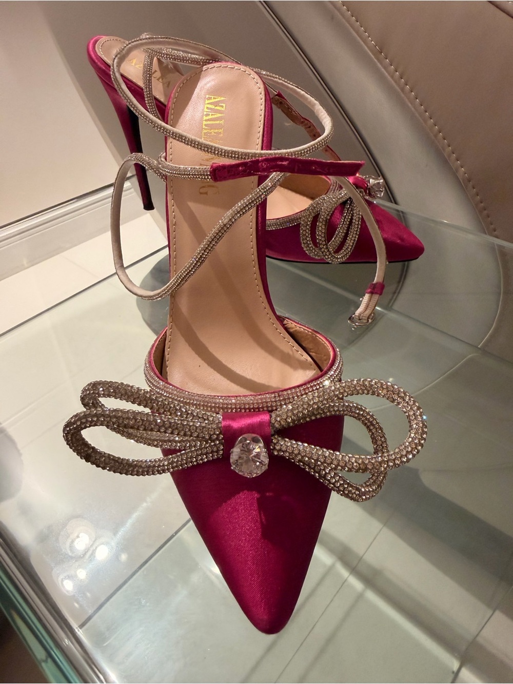Amina Muaddi Fuchsia Satin Pointed Toe Heels with Crystal Bow Detail